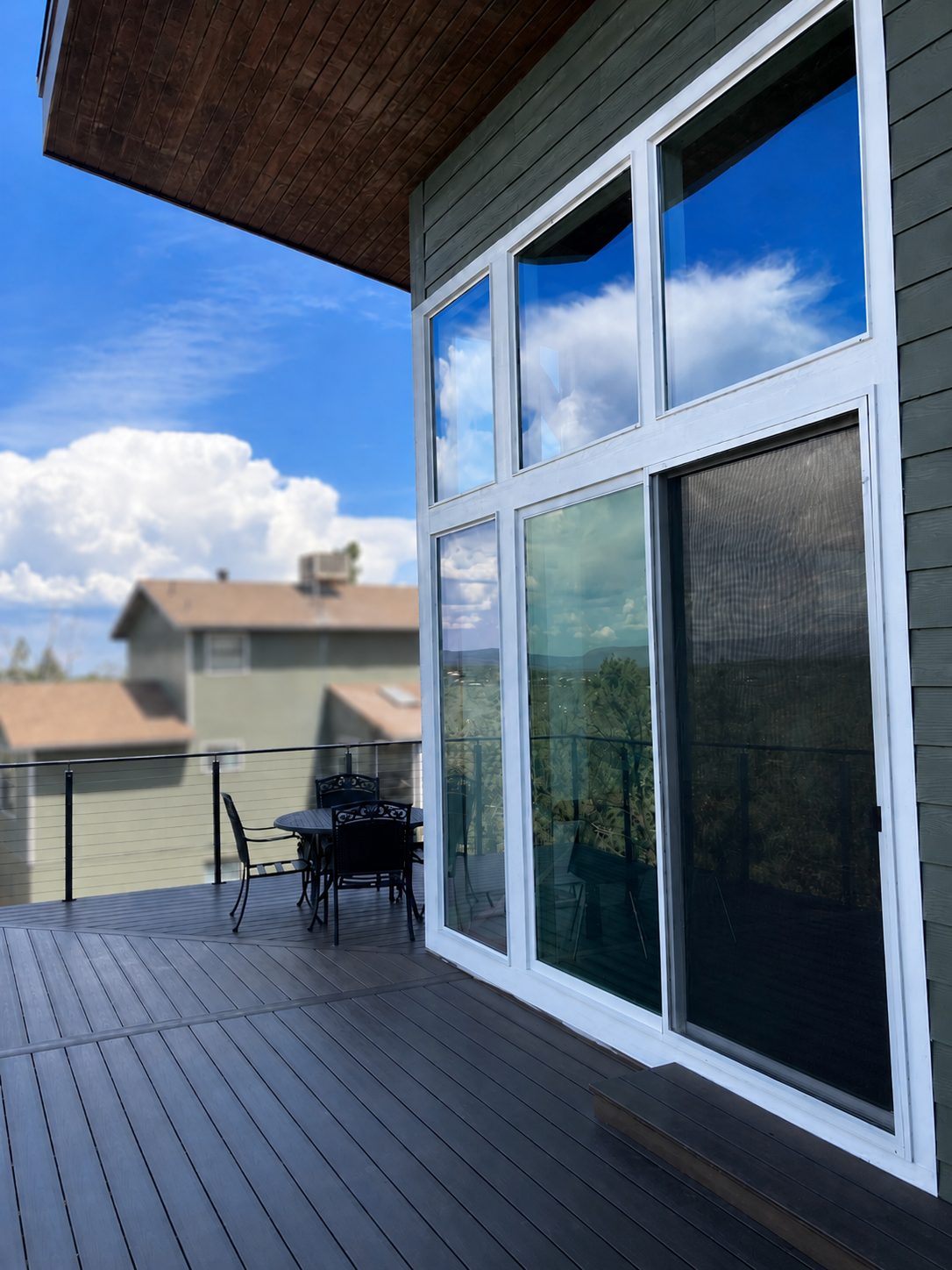 Cable railing and windows on the deck of a custom home built by Gila Home Solutions in Payson, Arizona