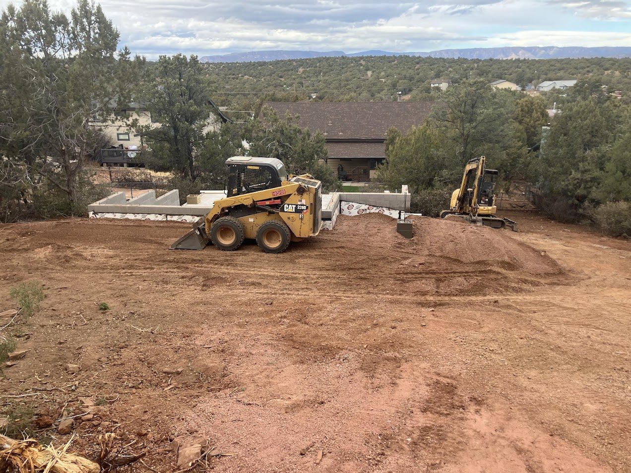 Foundation and site work underway for a custom hillside home in Payson, Arizona